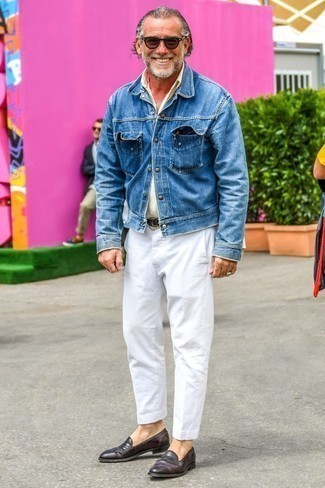 Blue Denim Jacket Outfits For Men: A blue denim jacket and white chinos will give off this relaxed and dapper vibe. Dark brown leather loafers are guaranteed to give a dash of elegance to this outfit.