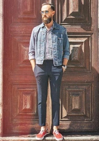 Blue Denim Jacket Outfits For Men: A blue denim jacket and navy chinos are a cool combination worth integrating into your day-to-day arsenal. A trendy pair of red canvas low top sneakers is the simplest way to add a confident kick to the outfit.