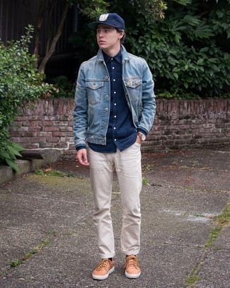Blue Baseball Cap Outfits For Men: Dress in a light blue denim jacket and a blue baseball cap for relaxed dressing with a city style twist. Tap into some David Gandy dapperness and lift up your getup with a pair of tobacco leather low top sneakers.