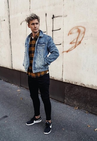 Black Jeans with Denim Jacket Outfits For Men: This off-duty pairing of a denim jacket and black jeans is a never-failing option when you need to look casual and cool in a flash. Complete this ensemble with a pair of black athletic shoes to make the outfit current.