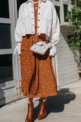 Brown Leather Ankle Boots Outfits: If you're scouting for a casual yet totaly stylish outfit, try teaming a white denim jacket with a tobacco polka dot linen midi dress. Go off the beaten path and spice up your look by rounding off with a pair of brown leather ankle boots.