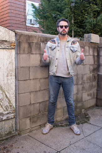 Light Blue Print Denim Jacket Outfits For Men: Dress in a light blue print denim jacket and blue ripped jeans if you're scouting for a look idea for when you want to look cool and casual. Why not throw beige print leather low top sneakers in the mix for an air of elegance?