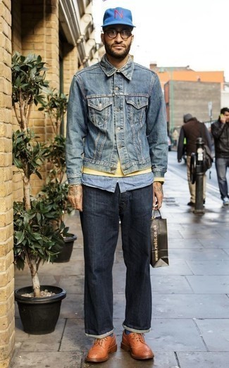 Blue Denim Jacket Outfits For Men: A blue denim jacket and navy jeans are amazing menswear essentials that will integrate perfectly within your casual styling arsenal. A trendy pair of tobacco leather brogues is an effortless way to breathe an added dose of sophistication into this look.
