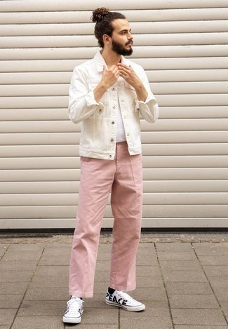 White Print Canvas Low Top Sneakers Outfits For Men: This laid-back combo of a white denim jacket and pink chinos is a tested option when you need to look stylish in a flash. Switch up this ensemble with more casual shoes, such as these white print canvas low top sneakers.