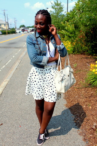 White and Navy Polka Dot Skater Skirt Outfits: This casual combination of a blue denim jacket and a white and navy polka dot skater skirt is super easy to pull together in no time, helping you look amazing and ready for anything without spending too much time going through your wardrobe. Add black polka dot low top sneakers to the equation and ta-da: this look is complete.