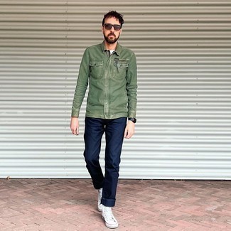 Navy Leather Watch Outfits For Men: To create an off-duty outfit with a street style spin, you can easily opt for an olive denim shirt and a navy leather watch. Get a little creative on the shoe front and smarten up your outfit by finishing with white canvas high top sneakers.