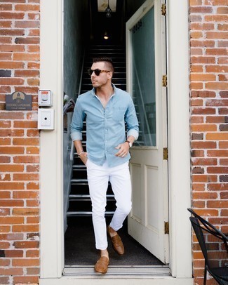 White Beaded Bracelet Outfits For Men: This combination of a light blue denim shirt and a white beaded bracelet is indisputable proof that a straightforward casual ensemble can still be extra dapper. Brown leather loafers are a fail-safe way to bring an added touch of elegance to this outfit.