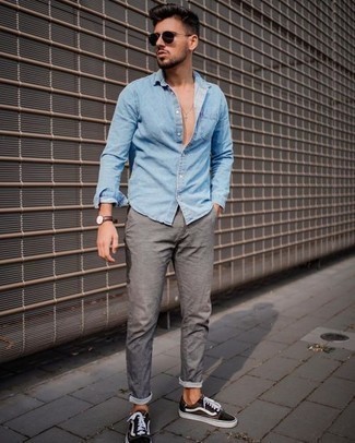 Dark Brown Canvas Low Top Sneakers Outfits For Men: If you enjoy relaxed dressing, pair a light blue denim shirt with grey chinos. When it comes to shoes, this ensemble pairs perfectly with dark brown canvas low top sneakers.
