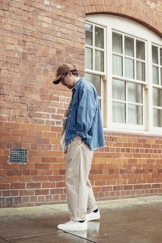 Beige Chinos Casual Outfits: Extremely dapper, this casual combination of a blue denim shirt and beige chinos provides with variety. Complete this look with white canvas low top sneakers and the whole look will come together.