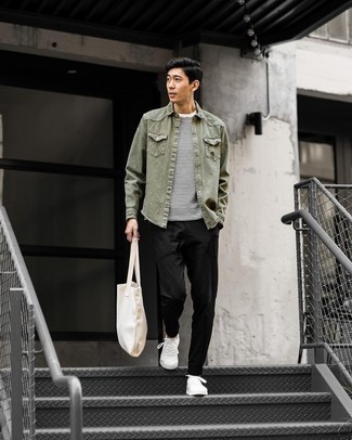 Olive Denim Shirt Outfits For Men: Teaming an olive denim shirt and black chinos will cement your expertise in menswear styling even on lazy days. A pair of white canvas low top sneakers is a good idea to complement this look.