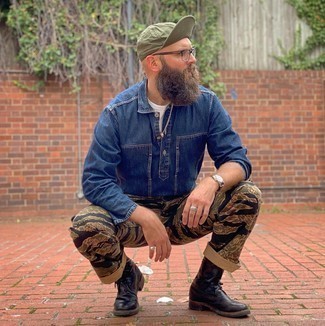 Olive Baseball Cap Outfits For Men: A navy denim shirt and an olive baseball cap are an easy way to infuse some cool into your day-to-day collection. Dark brown leather chelsea boots are an easy way to add a little kick to the outfit.