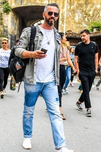 White Bracelet Outfits For Men: Try teaming a grey denim shirt with a white bracelet for a street style look that's also easy to wear. Complement your getup with a pair of white athletic shoes and you're all done and looking amazing.