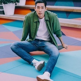 Mint Denim Shirt Outfits For Men: You'll be amazed at how easy it is for any gentleman to get dressed this way. Just a mint denim shirt and blue jeans. For extra style points, add a pair of white canvas low top sneakers to the equation.