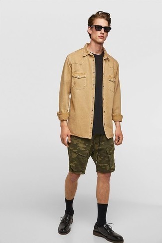 Black Leather Derby Shoes Outfits: Display your credentials in men's fashion by marrying a tan denim shirt and olive camouflage shorts for an off-duty ensemble. Go ahead and complete this getup with a pair of black leather derby shoes for a dose of elegance.