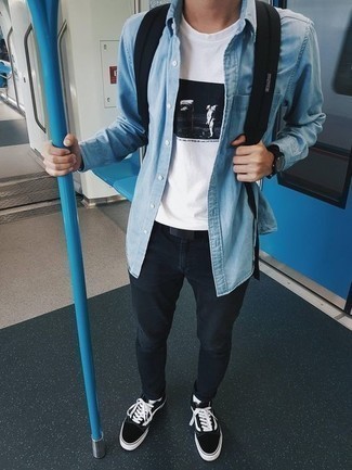 Black Canvas Backpack Outfits For Men: A light blue denim shirt and a black canvas backpack paired together are a match made in heaven for those who prefer cool and casual styles. To give your ensemble a more elegant spin, why not add a pair of black and white canvas low top sneakers to the mix?