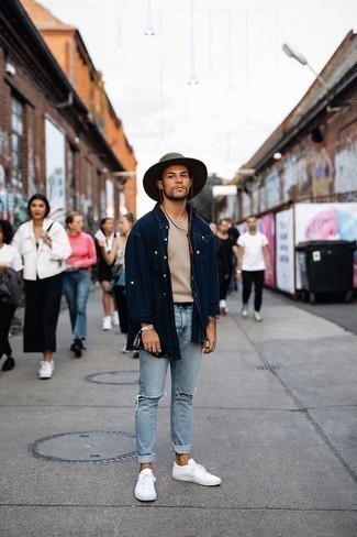 Dark Brown Hat Outfits For Men: To assemble a casual outfit with a twist, go for a navy denim shirt and a dark brown hat. And if you need to instantly step up your outfit with one item, why not complement this ensemble with white canvas low top sneakers?
