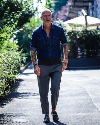 Navy Denim Shirt Outfits For Men: Teaming a navy denim shirt and charcoal dress pants is a guaranteed way to inject your styling arsenal with some rugged sophistication. You can get a bit experimental with shoes and dress up your ensemble with navy leather loafers.