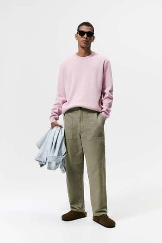 Pink Long Sleeve T-Shirt Outfits For Men: This look with a pink long sleeve t-shirt and olive chinos isn't so hard to pull off and is easy to change according to circumstances. Let your styling chops really shine by rounding off this outfit with a pair of dark brown suede loafers.
