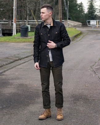 Black Denim Shirt Outfits For Men: This laid-back combo of a black denim shirt and dark green chinos is a foolproof option when you need to look casual and cool but have zero time to dress up. Complete your ensemble with a pair of tan leather casual boots to completely change up the ensemble.