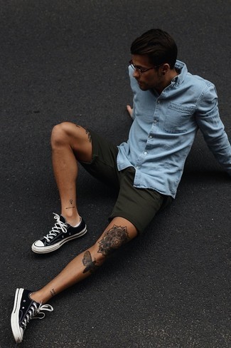 Dark Green Shorts Outfits For Men: A light blue denim shirt looks especially cool when worn with dark green shorts in an off-duty outfit. Black and white canvas low top sneakers will pull the whole thing together.