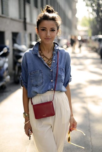 Women's Blue Denim Shirt, White Tapered Pants, Red Leather Crossbody Bag, Gold Necklace