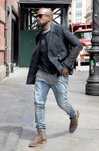 Kanye West wearing Black Double Breasted Blazer, Black Crew-neck Sweater, Grey Crew-neck T-shirt, Light Blue Jeans