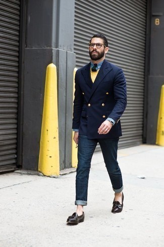 Mustard Crew-neck Sweater Outfits For Men: To put together a relaxed casual ensemble with a modernized spin, consider pairing a mustard crew-neck sweater with navy jeans. Complete your look with dark brown leather tassel loafers to instantly switch up the look.