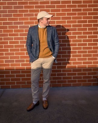 Tobacco Crew-neck Sweater Outfits For Men: If you prefer relaxed style, why not pair a tobacco crew-neck sweater with khaki chinos? Finish off this outfit with a pair of brown leather loafers to switch things up.
