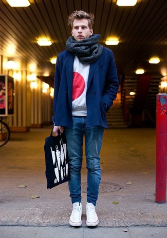 White and Red Print Crew-neck Sweater Outfits For Men: The pairing of a white and red print crew-neck sweater and blue skinny jeans makes for a killer laid-back look. Introduce a pair of white low top sneakers to the mix to make the outfit a bit more sophisticated.