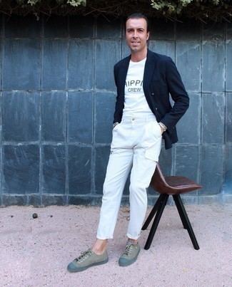 White Cargo Pants Outfits: Rev up the masculinity factor in a navy double breasted blazer and white cargo pants. Round off with olive canvas low top sneakers to transform this look.