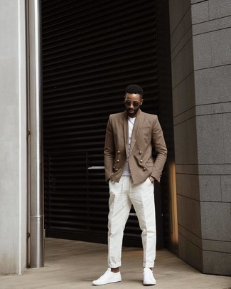Brown Double Breasted Blazer Outfits For Men: Marrying a brown double breasted blazer and white chinos is a guaranteed way to inject your wardrobe with some manly sophistication. A pair of white canvas low top sneakers will add edginess to your outfit.
