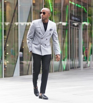 Grey Double Breasted Blazer Outfits For Men: One of the classiest ways to style such a hard-working menswear piece as a grey double breasted blazer is to marry it with black dress pants. To give your overall outfit a more relaxed spin, why not complement this look with a pair of black leather tassel loafers?