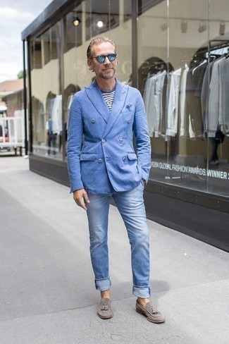 Light Blue Blazer Outfits For Men: This combination of a light blue blazer and light blue jeans will add effortlessly sleek essence to your ensemble. Complement your getup with a pair of grey suede tassel loafers to immediately amp up the fashion factor of any look.