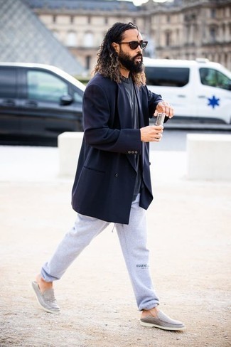 Navy Double Breasted Blazer Outfits For Men: A navy double breasted blazer and grey sweatpants are the ideal way to infuse extra refinement into your casual fashion mix. Introduce a pair of grey canvas loafers to the equation to effortlessly up the wow factor of this outfit.