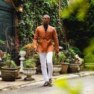 White Cargo Pants Outfits: A tobacco double breasted blazer and white cargo pants matched together are the perfect combo for those dressers who prefer classy styles. For something more on the sophisticated end to finish your ensemble, add brown leather tassel loafers to this ensemble.