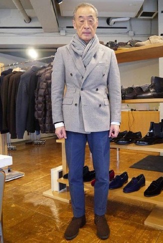 Grey Wool Double Breasted Blazer Outfits For Men: Go for a pared down but classy option by opting for a grey wool double breasted blazer and navy chinos. Let your styling credentials truly shine by finishing off your look with a pair of dark brown suede desert boots.
