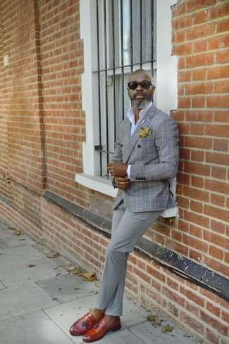 Grey Plaid Double Breasted Blazer Outfits For Men: A grey plaid double breasted blazer and grey chinos are a combination that every modern gentleman should have in his menswear arsenal. Inject a dash of elegance into your outfit by rounding off with tobacco leather tassel loafers.