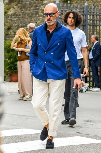 Navy Suede Loafers Outfits For Men: This pairing of a blue double breasted blazer and white chinos is perfect when you need to look effortlessly smart but have zero time. Navy suede loafers will infuse an added touch of sophistication into an otherwise too-common outfit.