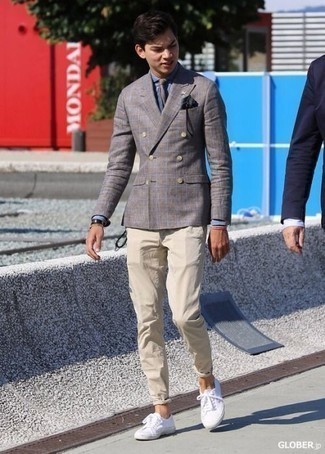 Grey Plaid Double Breasted Blazer Outfits For Men: Marrying a grey plaid double breasted blazer and beige chinos is a surefire way to inject your current collection with some relaxed elegance. With shoes, follow the casual route with a pair of white canvas low top sneakers.