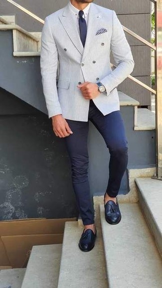 Navy Leather Tassel Loafers Outfits: Pair a light blue double breasted blazer with navy chinos for a clean polished menswear style. Feeling venturesome? Spice things up by rocking a pair of navy leather tassel loafers.
