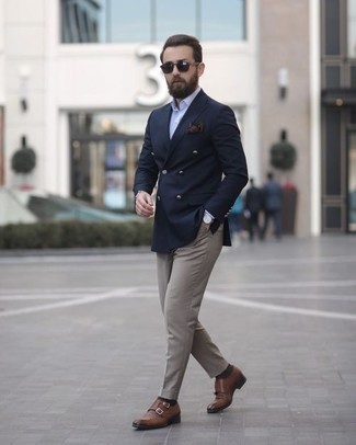 Tobacco Leather Double Monks Outfits: The formula for a neat and effortlessly smart look? A navy double breasted blazer with grey chinos. Inject a hint of elegance into this look by finishing off with a pair of tobacco leather double monks.