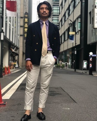 White Canvas Belt Outfits For Men: Go for a pared down yet casually dapper option pairing a navy double breasted blazer and a white canvas belt. Want to play it up in the shoe department? Complement your look with black leather loafers.