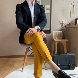 Mustard Chinos Outfits: For a casually refined menswear style, consider pairing a navy double breasted blazer with mustard chinos — these pieces play nicely together. Black leather loafers are a simple way to give an air of class to your ensemble.