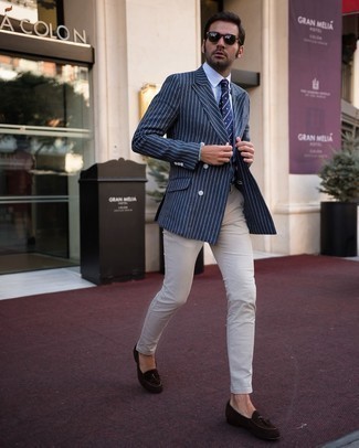 Blue Vertical Striped Blazer Outfits For Men: A blue vertical striped blazer and beige chinos make for the perfect base for an outfit. And if you want to easily up the style ante of this getup with a pair of shoes, introduce dark brown suede tassel loafers to this outfit.