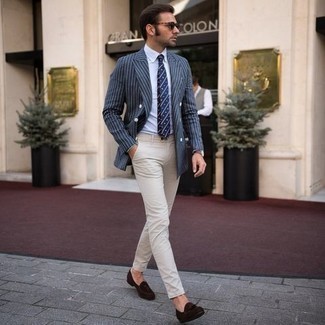 Beige Chinos Smart Casual Outfits: A navy vertical striped double breasted blazer and beige chinos are among those sport-anywhere-anytime pieces that have become the fundamental elements in any modern man's sartorial collection. Dial down the casualness of this ensemble with dark brown suede tassel loafers.