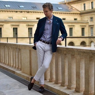 Tobacco Fringe Leather Loafers Outfits For Men: Try pairing a navy double breasted blazer with white chinos for a proper sophisticated look. And if you need to easily perk up this look with a pair of shoes, complete this outfit with tobacco fringe leather loafers.