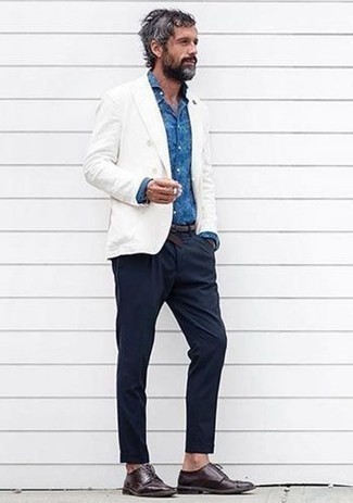 Blue Print Dress Shirt Outfits For Men: A blue print dress shirt and navy chinos are among the foundations of a smart wardrobe. Avoid looking too casual by rounding off with a pair of dark brown leather derby shoes.
