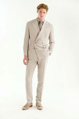 Beige Double Breasted Blazer Outfits For Men: Channel your inner Kingsman agent and choose a beige double breasted blazer and beige dress pants. And if you need to instantly dress down your look with footwear, complement your ensemble with beige suede tassel loafers.