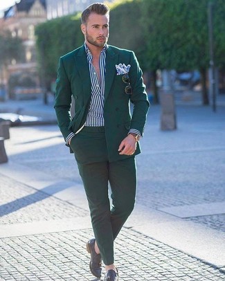 Dark Green Double Breasted Blazer Outfits For Men: This combination of a dark green double breasted blazer and dark green dress pants is a real lifesaver when you need to look like a true expert in men's style. Feeling venturesome today? Spice things up by slipping into a pair of black leather tassel loafers.