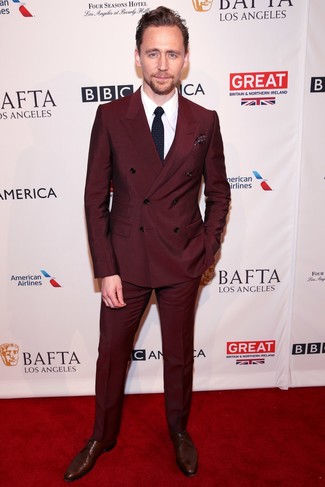 Tom Hiddleston wearing Burgundy Double Breasted Blazer, White Dress Shirt, Burgundy Dress Pants, Burgundy Leather Derby Shoes